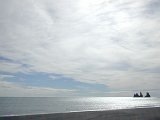 Day 12 - Isolated rocks on a black ash beach